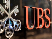 UBS банк снизил чистую прибыль на 54%
